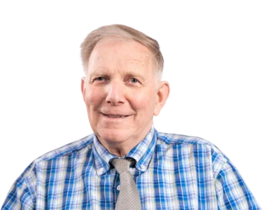 Portret van een oudere man die gelukkig uit zijn ogen kijkt. Door de WeMove Family kan hij actiever zijn dan voorheen. Dit maakt hem gelukkig.